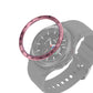 Smart watch with rose pink bezel ring and black dial, gray silicone strap
