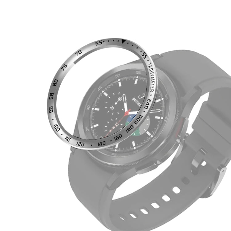Smartwatch bezel ring attachment on black watch with silver bezel and dark chronograph dial
