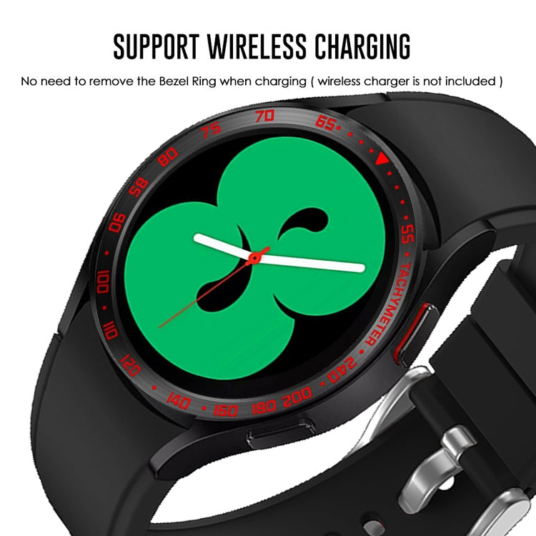Smartwatch bezel ring attachment on black watch with red bezel markings and green clover dial