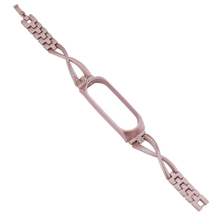 Rose gold X-shaped watch band with rhinestone inlay and metal clasp