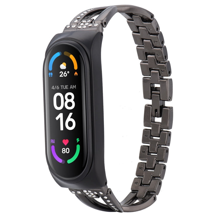 Black X-shaped alloy replacement watch band with rhinestone accents and metal links
