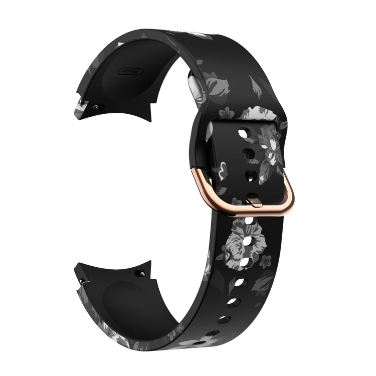 Black silicone smartwatch strap with gray floral pattern, rose-gold buckle and pin holes