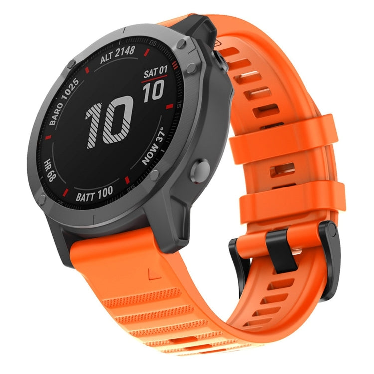 Orange silicone smartwatch replacement strap with perforated texture and adjustable buckle