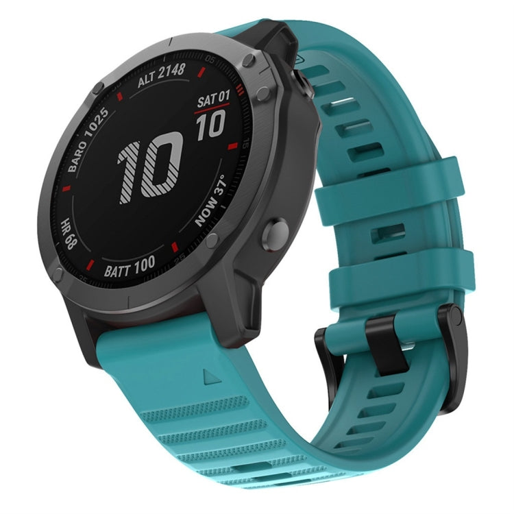 Silicone smartwatch replacement strap for Garmin, teal green, with adjustable buckle holes