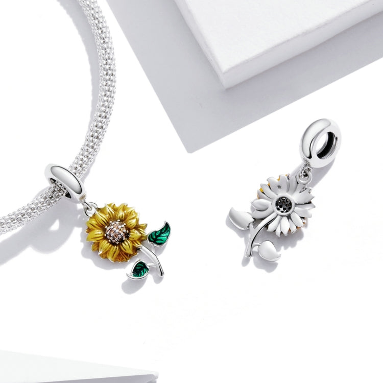 Silver chain necklace with sunflower charm, yellow flower and green enamel leaves