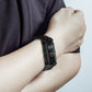 Black rugged nylon watchband worn on wrist with fitness tracker display
