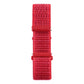 Red nylon watch band with two snap connectors and hook-and-loop fastener, close-up