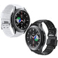 Two watches with silicone straps: white strap and black strap, both with dark dials.