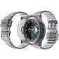 Watch with dark dial and silver metal link strap, shown in a side view.