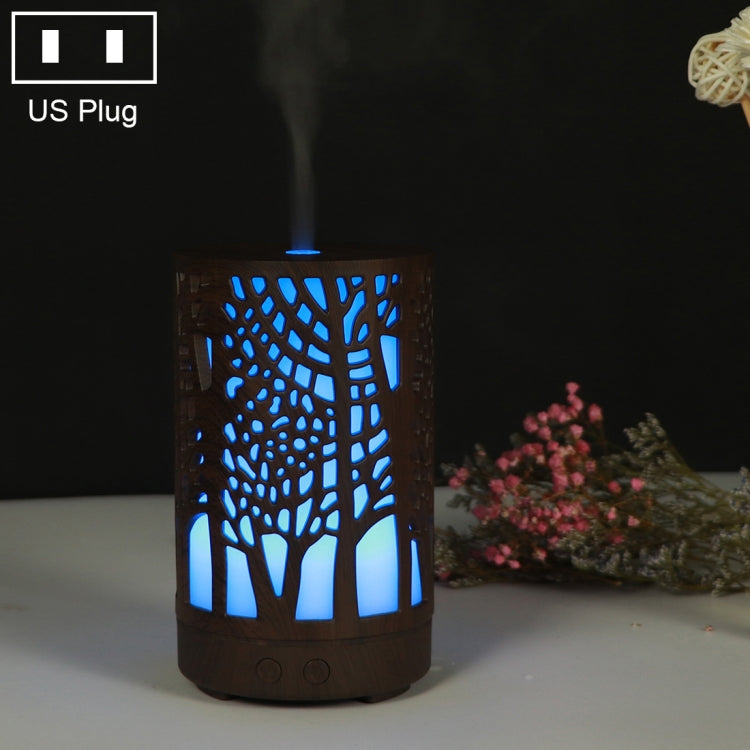 Wooden ultrasonic essential oil humidifier with tree-cutout pattern and blue LED glow