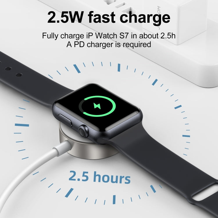 Magnetic charging cable connected to smartwatch on a round charging puck