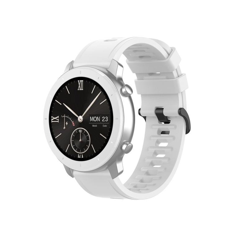 White silicone smartwatch replacement strap with adjustable buckle and perforated adjustment holes