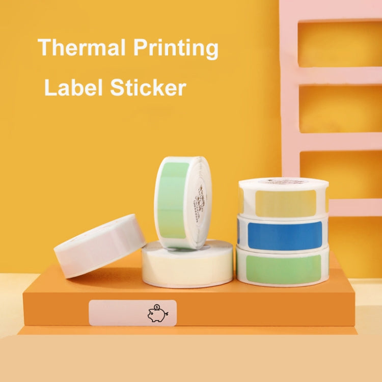 Thermal label sticker rolls in mint green and lemon yellow with blank labels