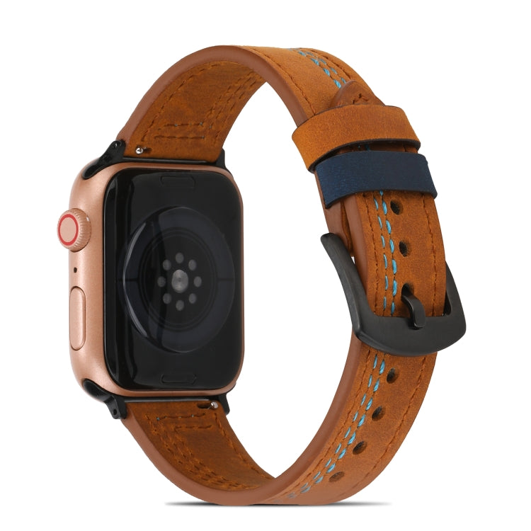 Brown matte leather watch band with blue strap end and metal buckle
