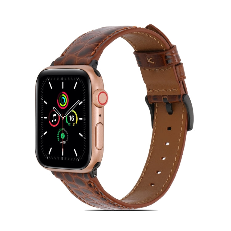 Crocodile-texture leather watch band, brown with tan underside and stitched holes.