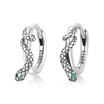 Sterling silver snake ear cuff earrings with green eye detail, hinged buckle style