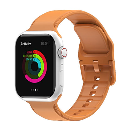 Walnut silicone watch band with perforated strap and clasp for Apple Watch.