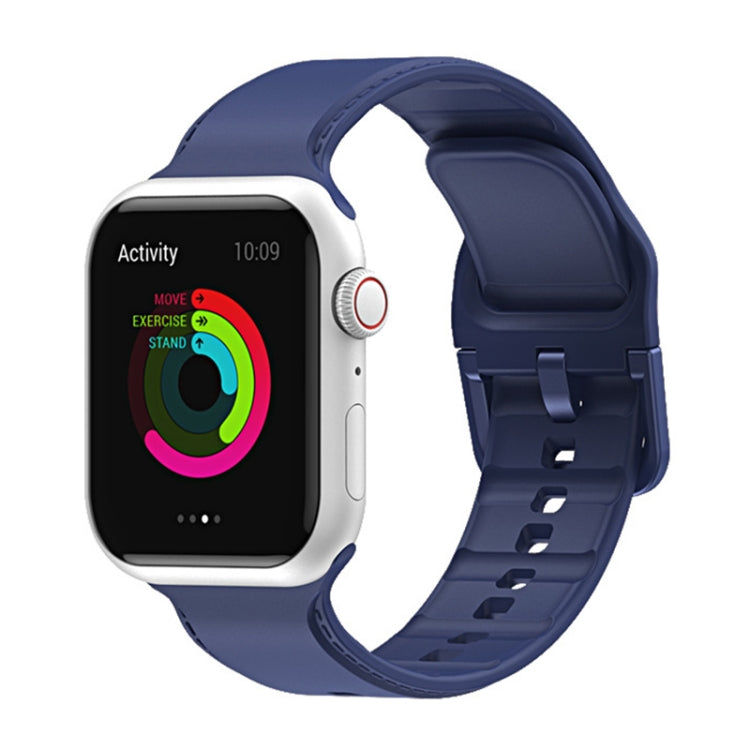 Midnight blue silicone watch band with perforated strap and clasp for Apple Watch.