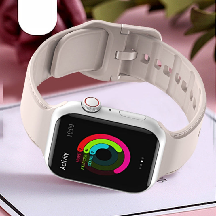 White silicone watch band with metal clasp and perforated holes for Apple Watch.