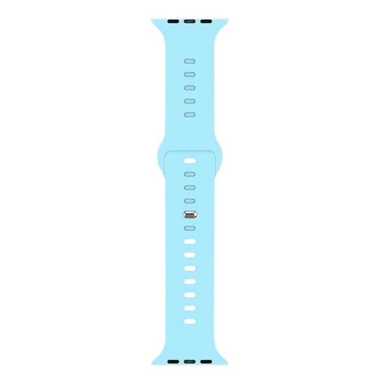 Light blue liquid silicone watchband with pin-and-loop buckle and perforation holes.