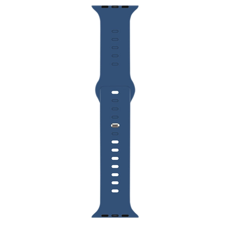 Dark blue liquid silicone watchband with pin-and-loop buckle and perforation holes.