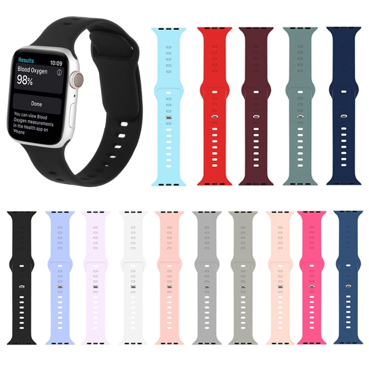 Set of liquid silicone watchbands in assorted colors, each with perforation holes.