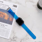 Royal blue transparent jelly Apple Watch strap with metal buckle and black smartwatch face