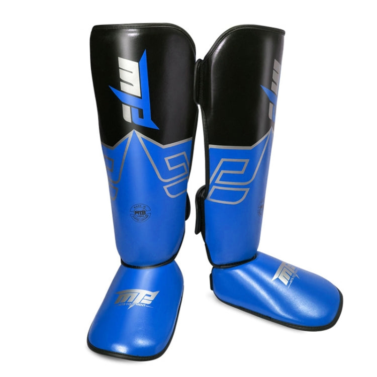 Blue Thai boxing shin guards with padded ankle area and black side panels
