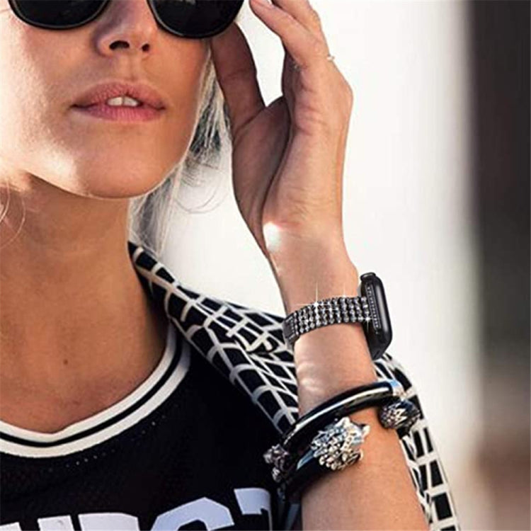 Diamond-set metal watch band for Apple Watch, silver four-row crystal wrap on wrist