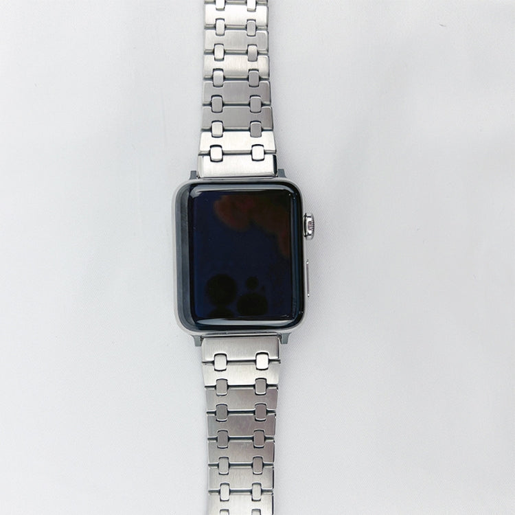 Square smartwatch on a silver metal link band, top and bottom links visible