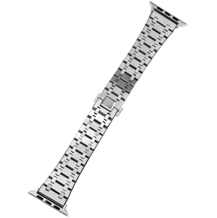 Silver metal link watch band with foldover clasp, close angled end with pin holes