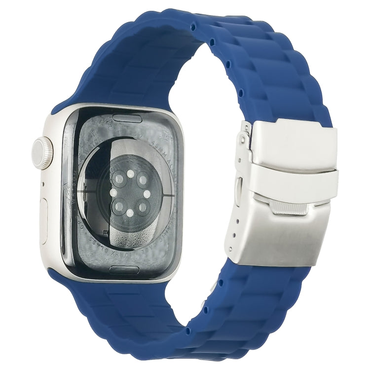 Three-bead watchband with dark blue silicone links and silver metal clasp, shown on watch