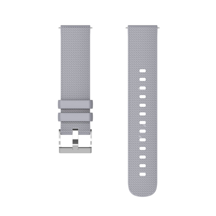 Gray silicone watch strap with silver-tone buckle and perforated link holes