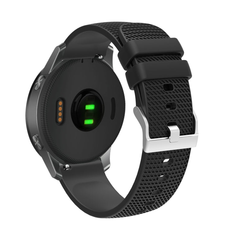 Black textured silicone watch strap with silver-tone buckle and perforated pattern