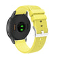 Yellow textured silicone watch strap with silver-tone buckle and perforated pattern