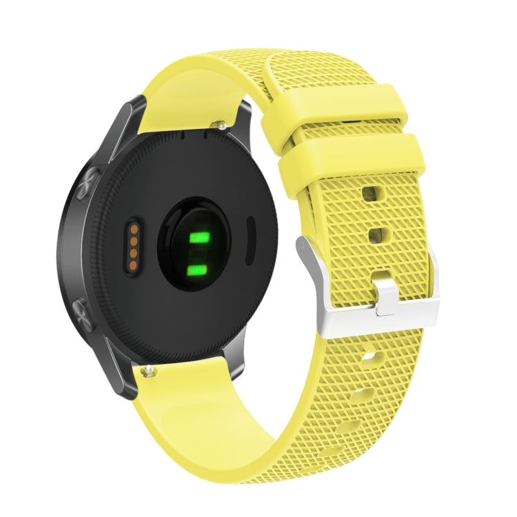 Yellow textured silicone watch strap with silver-tone buckle and perforated pattern