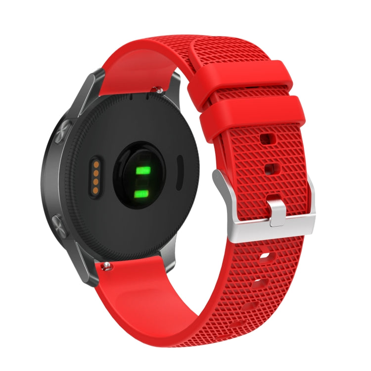 Red textured silicone watch strap with silver-tone buckle and perforated pattern