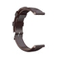 Oil-wax leather smartwatch strap in dark brown with metal buckle and adjustment holes