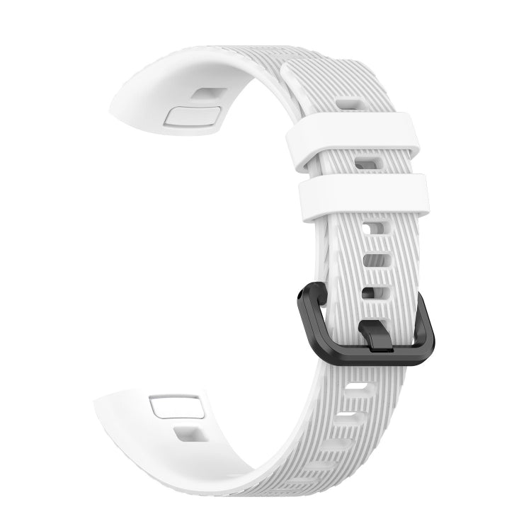 White silicone watch strap with ridged texture and adjustable buckle