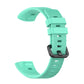 Cyan silicone watch strap with ridged texture and adjustable buckle