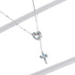 Silver heart pendant necklace with blue-green stone cross drop on chain