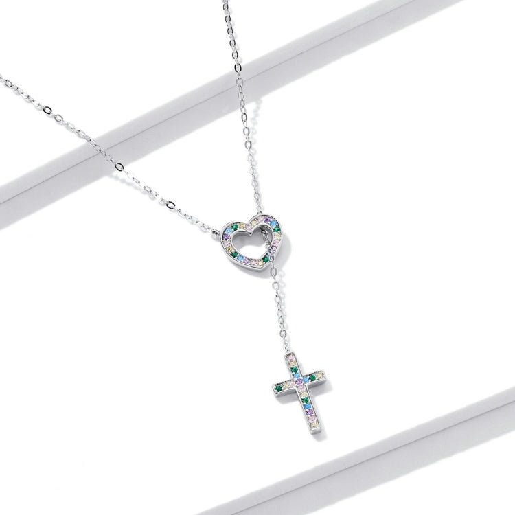 Silver heart pendant necklace with blue-green stone cross drop on chain