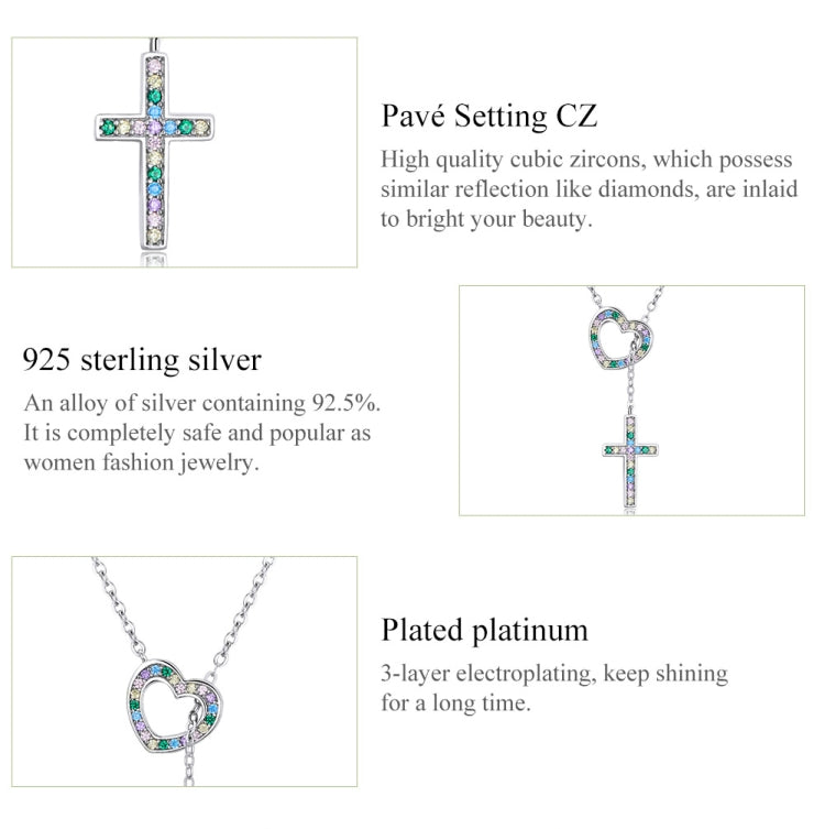 Sterling silver love cross necklace with heart and cross charms set with stones