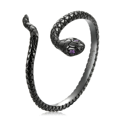 Sterling silver snake ring with black textured band and purple stones