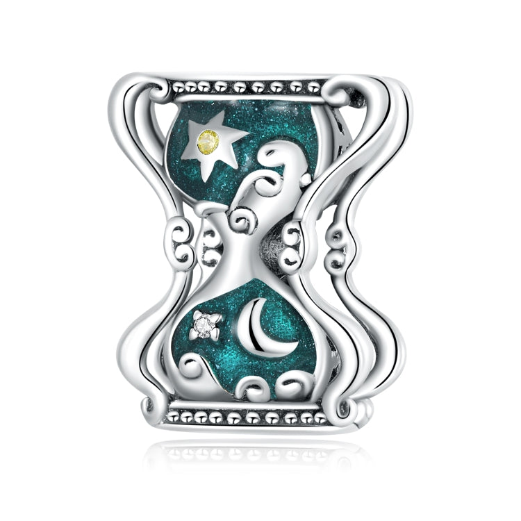 Sun and moon hourglass charm bead with teal enamel, star and crescent, silver frame
