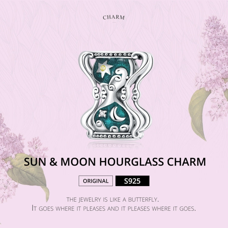 Sun and moon hourglass charm bead in silver tone with teal enamel stars and moon