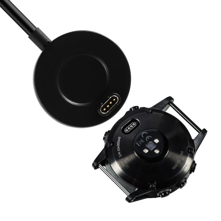 Round black charging base with charging connector for Garmin watches