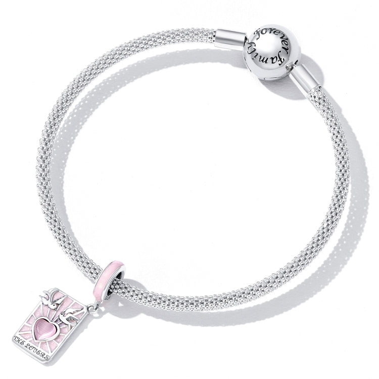 Sterling silver mesh charm bracelet with pink enamel tarot card pendant near clasp
