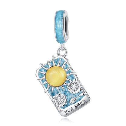 Sterling silver tarot card sun charm pendant with blue enamel and yellow sun center