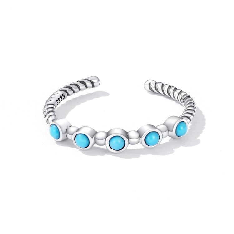 Sterling silver open ring with twisted ridged band and five blue turquoise cabochons